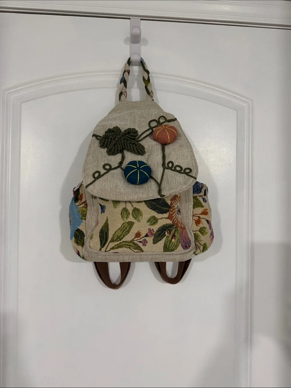 Hand Crafted Beige Floral Embroidered Backpack with Blue & Orange Accents